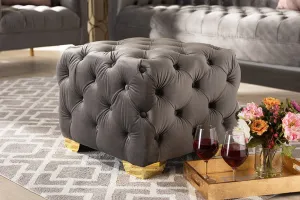 Matthew Gray Velvet Fabric Upholstered Gold Finished Button Tufted Ottoman